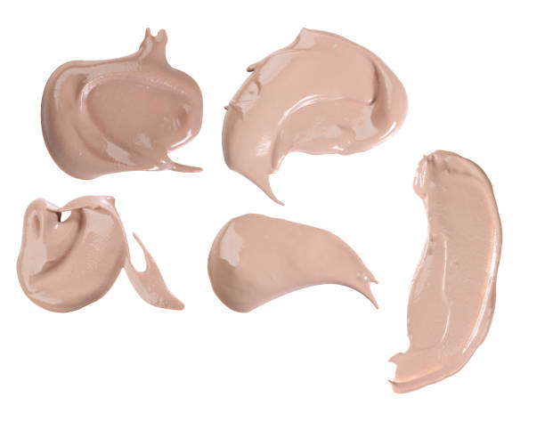 istock Various make up liquid powder strokes on white background 531425815