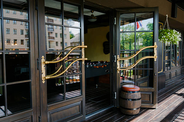 istock Glazed entrance to the luxurious restaurant - door opens 531427619