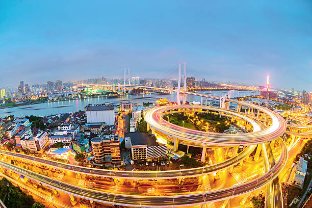 istock shanghai elevated road junction and interchange overpass at night 531427787