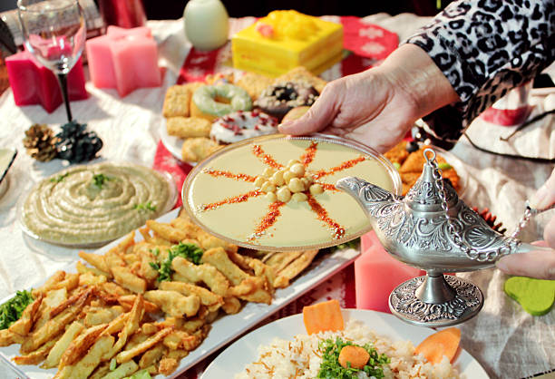 istock Dressing Hummus over table of home made buffet 531428143