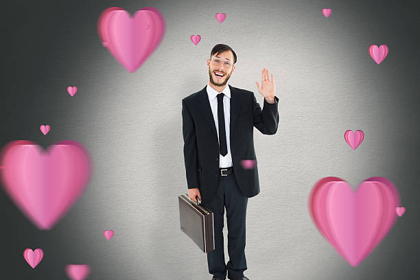 istock Composite image of geeky businessman waving at camera 531428189