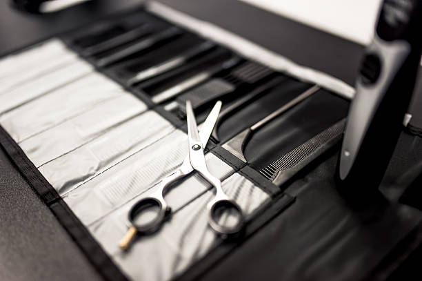 istock professional haidresser tools on table with close-up of scissors 531429139