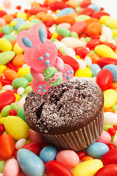 istock Easter pastry, chocolate muffin with sugar easter bunny, sugar eggs 531429613