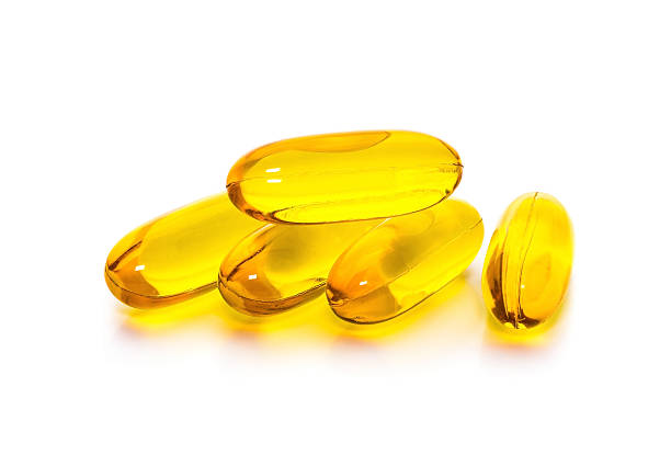 istock Fish oil capsules isolated on white background 531430743
