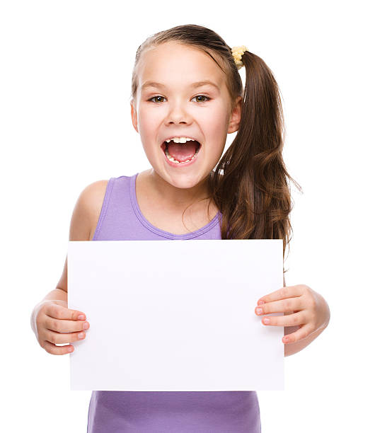 istock Girl is holding blank banner 531432153