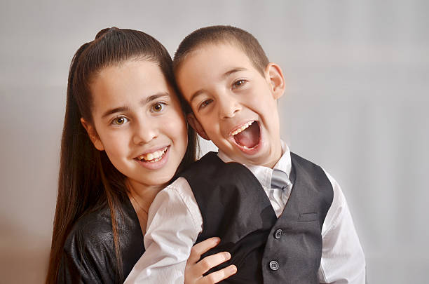 istock Bat Mitzvah girl with her brother 531440671