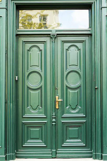 istock Green old wooden doors, Wroclaw Poland 531443349