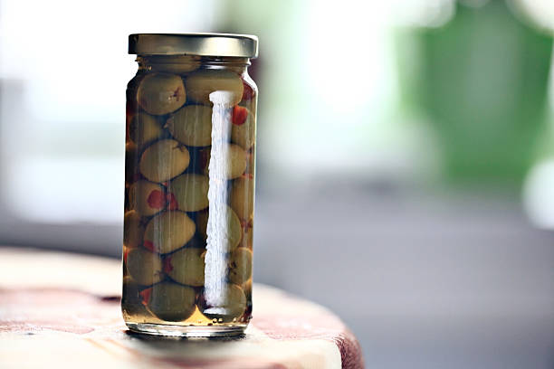 istock bank with green olives 531443495