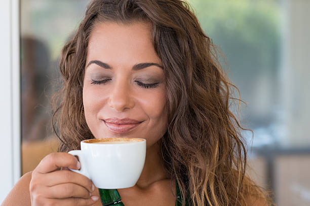 istock Carefree Woman Drinking Capuccino 531444681
