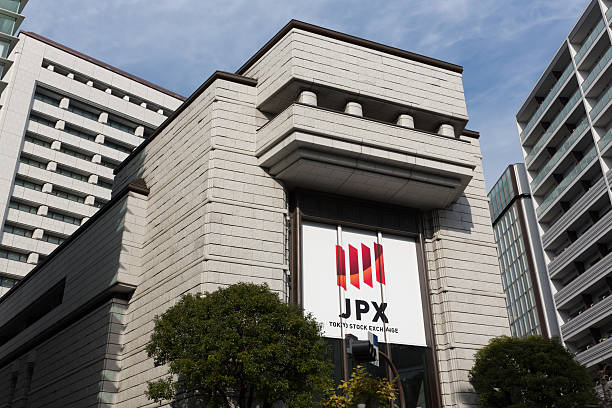 Tokyo Stock Exchange in Japan Tokyo, Japan - December 24, 2014 : Tokyo Stock Exchange headquarters building in Kabutocho, Tokyo, Japan. Kabutocho is the largest financial district in Japan.  dealing room photos stock pictures, royalty-free photos & images