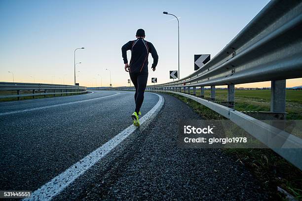 Running On The Road Stock Photo - Download Image Now - 2015, Active Lifestyle, Adult