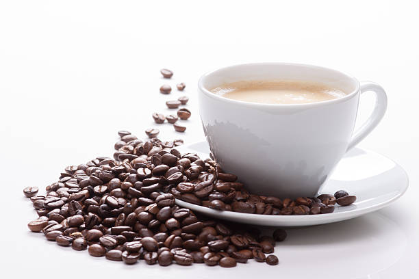 cup of coffee with beans stock photo