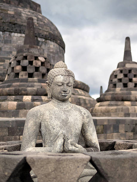 istock Buddha Statue at Borobudur Temple, Yogyakarta, Java, Indonesia. 531447303