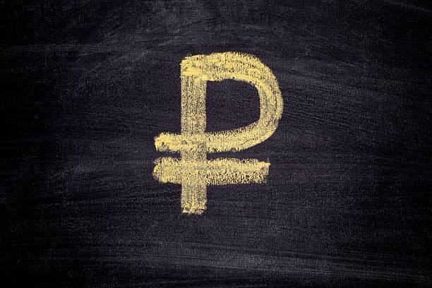 istock Drawn ruble sign on black chalkboard background 531455234