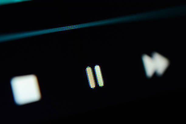 Close up of media player touchscreen buttons (pause button focused)