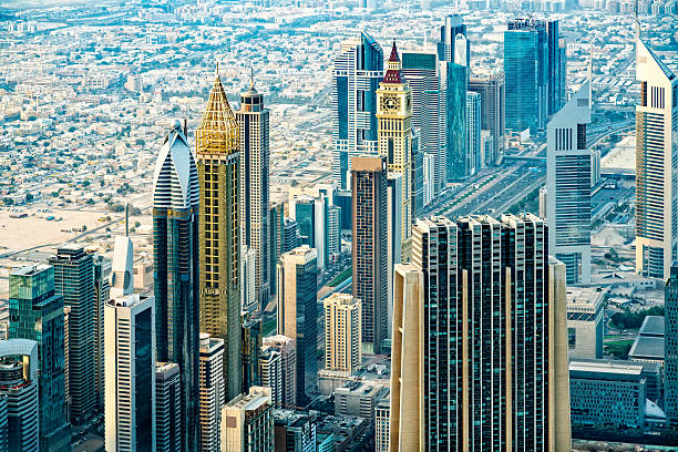 Modern skyscrapers in Downtown Dubai along E11 Sheikh Zayed Road highway, Dubai, United Arab Emirates. Shot from rare perspective. Taken by Sony a7R II, 42 Mpix.