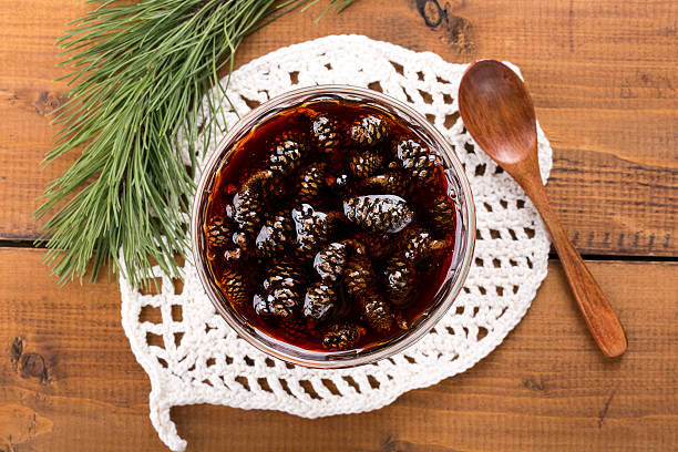 istock Jam of young green pine cones 531458924