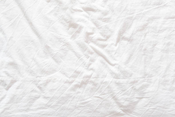 istock Top view of a messy bedding sheet after night sleep. 531459082