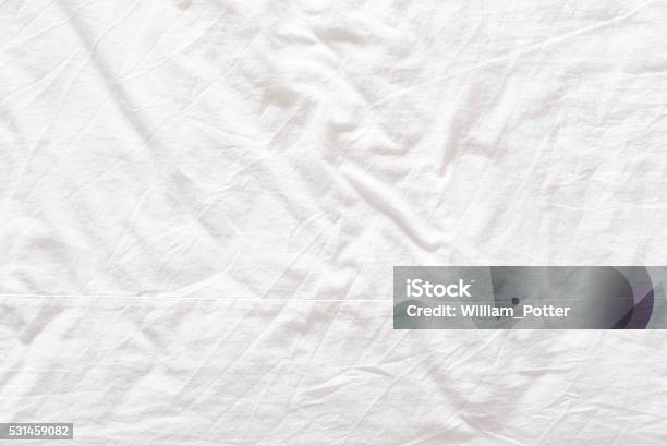 Top View Of A Messy Bedding Sheet After Night Sleep Stock Photo - Download Image Now