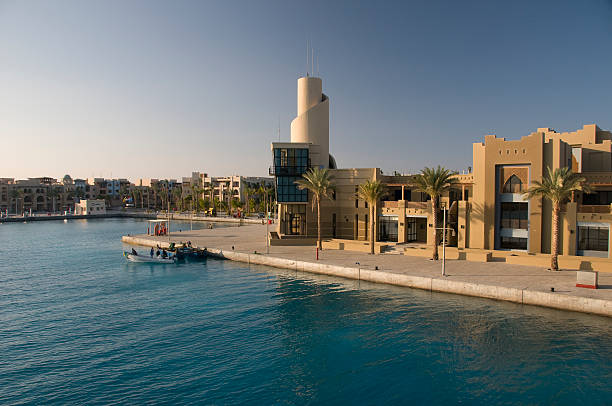 Idylic beach with palms and sun umbrelas, Red Sea, Egypt