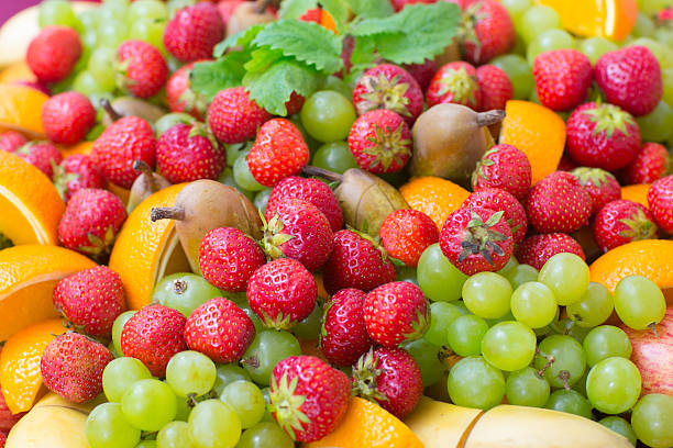 Tło z świeżych jagód i owoców – zdjęcie