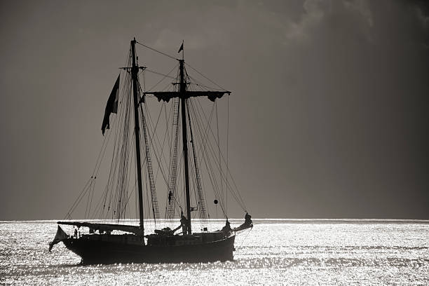 istock Vintage sailing boat at dusk. 531460511