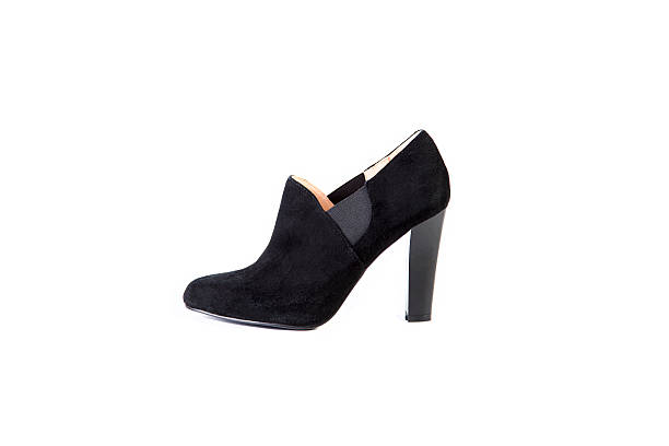 istock Suede women's boots on a white background, black shoes 531461400