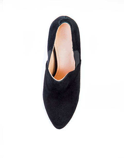 istock Suede women's boots on a white background, black shoes 531461674
