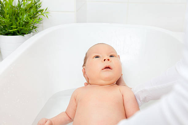 istock Bathtime for a cute little newborn 531462722