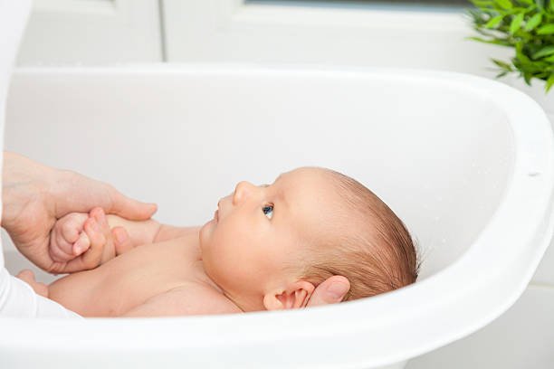 istock Bathtime for a cute little newborn 531462994