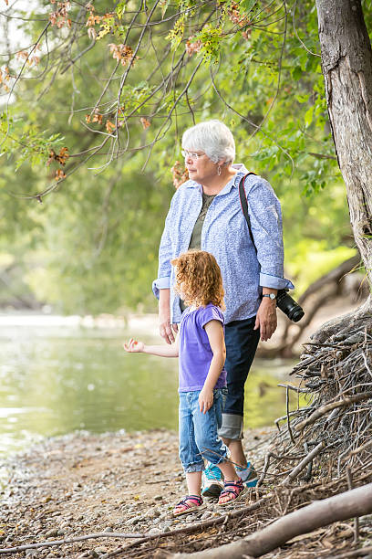 istock Girls & Grandma On Riverbank 531463372