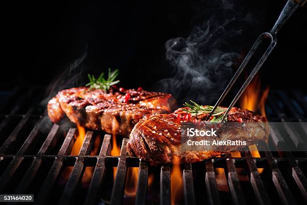 Beef Steaks On The Grill Stock Photo - Download Image Now - Barbecue - Meal, Barbecue Grill, Meat