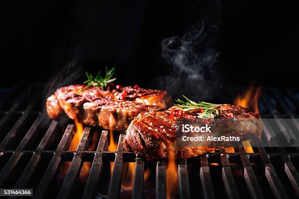 Beef Steaks On The Grill Stock Photo - Download Image Now - Barbecue Grill, Meat, Barbecue - Meal