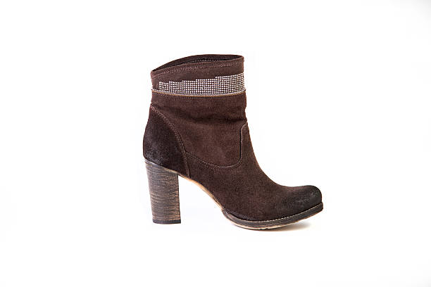 istock women's shoes on a white background, brown boots with rhinestones 531464550
