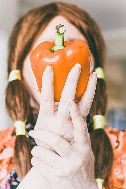 istock fun instagram creative shot of pepper hiding a woman 531465679