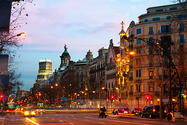 BARCELONA, SPAIN - FEBRUARY 13, 2014: Passeig de Gracia  in winter dawn. Barcelona, Spain