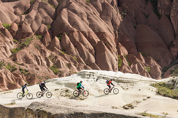 istock Mountainbiking white tuff waves in Cappadocia, Turkey 531466788