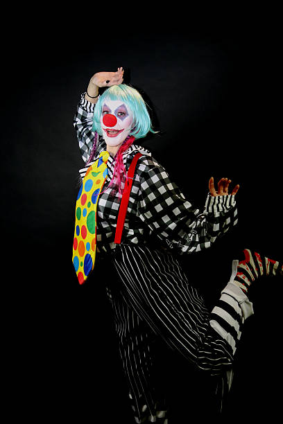 istock Female Clown Kicking Up Her Heels 531466803