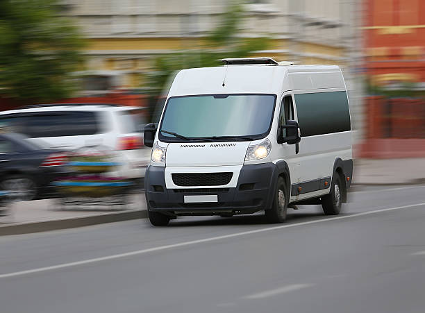 istock minibus goes on the city street 531466832