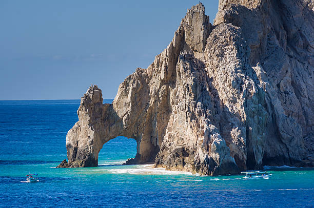 istock El Arco rock formation with boats 531466861