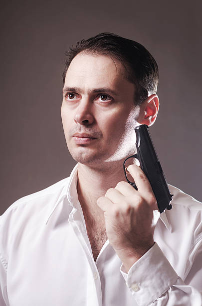 istock The serious man with the pistol 531467464