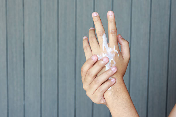 istock Woman applying hands cream 531468386