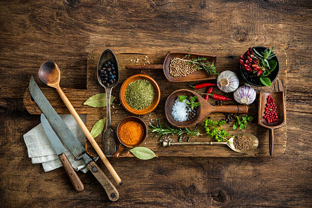 istock Colorful spices on wooden table 531468932