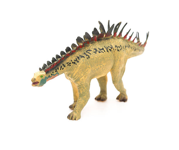 istock yellow huayangosaurus toy on a white background 531469082
