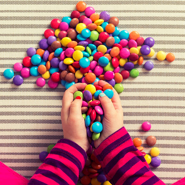 istock Anonymous preschool girl playing with colorful sweets 531469514