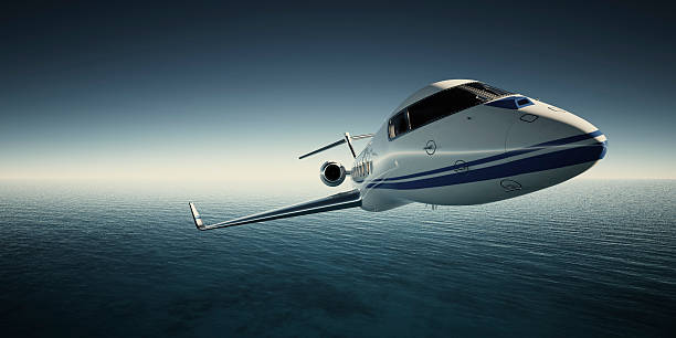 istock Photo of White Luxury Generic Design Private Jet Flying in 531469974