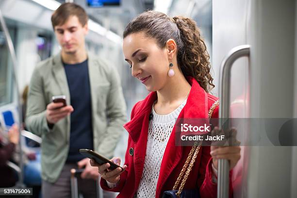 Passengers In Metro Wagon Stock Photo - Download Image Now - Map, Portable Information Device, Smart Phone