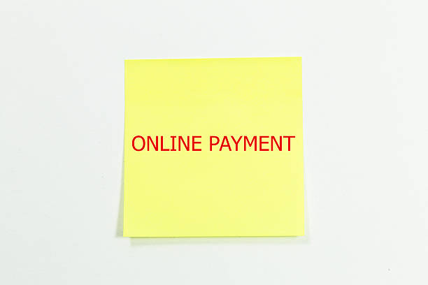 istock online payment word written on yellow sticky notes. 531475112