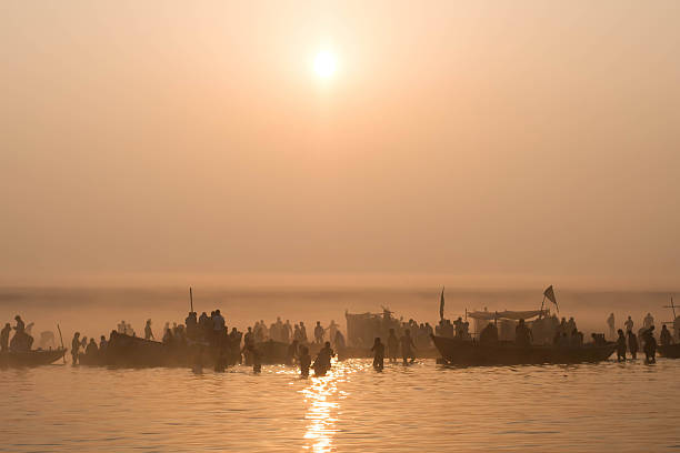 istock Pilgrims Bathing in the Ganges at Sunrise in Varanasi, India 531475471