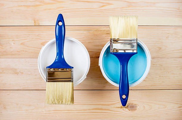 istock brush and paint on wooden boards 531476154